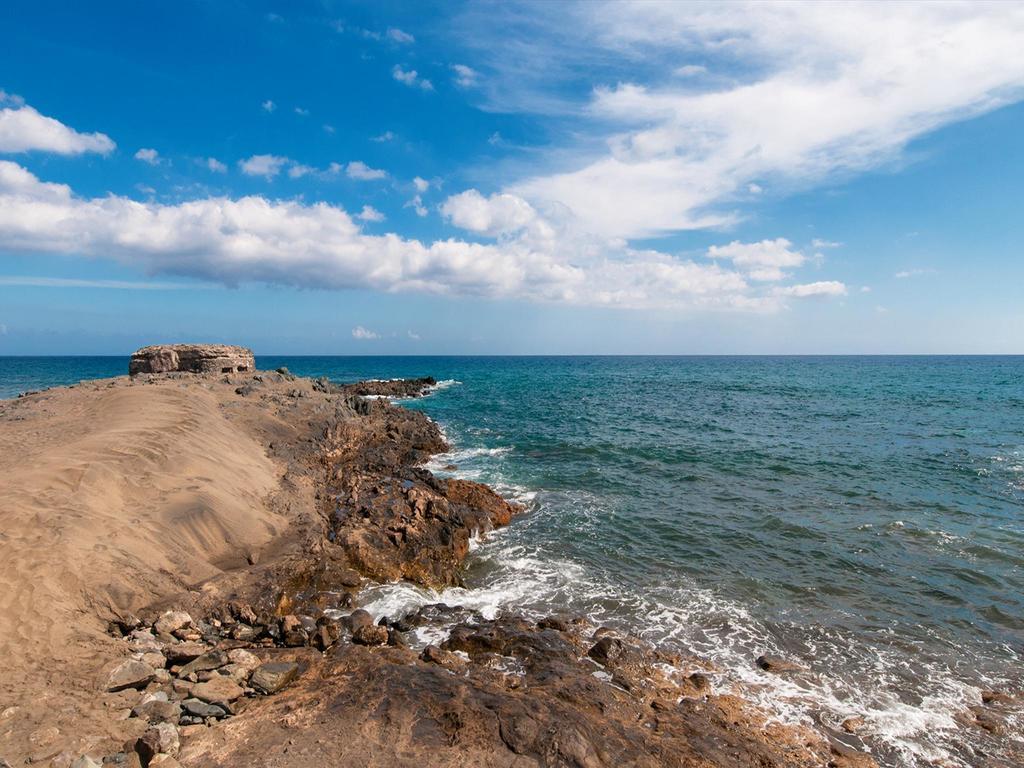 Beach House Adelfas San Agustin Mci Bagian luar foto